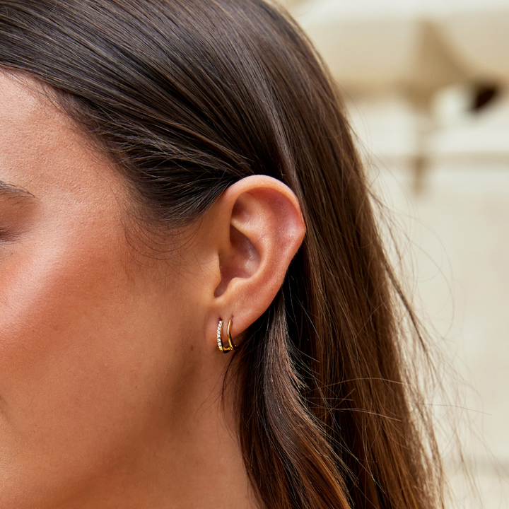 Claw gold crystal earrings