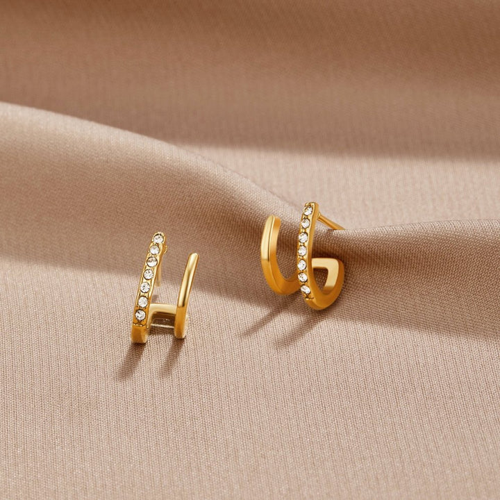 Claw gold crystal earrings