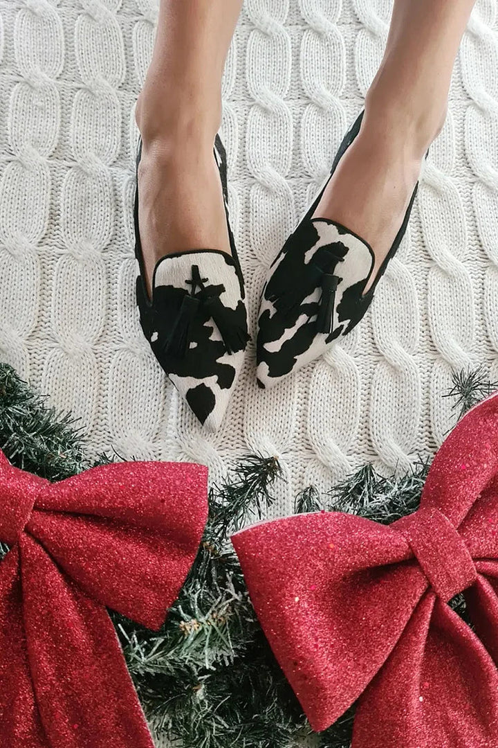 Lauryn - Elegant moccasins with a pointed toe and decorative tassel details