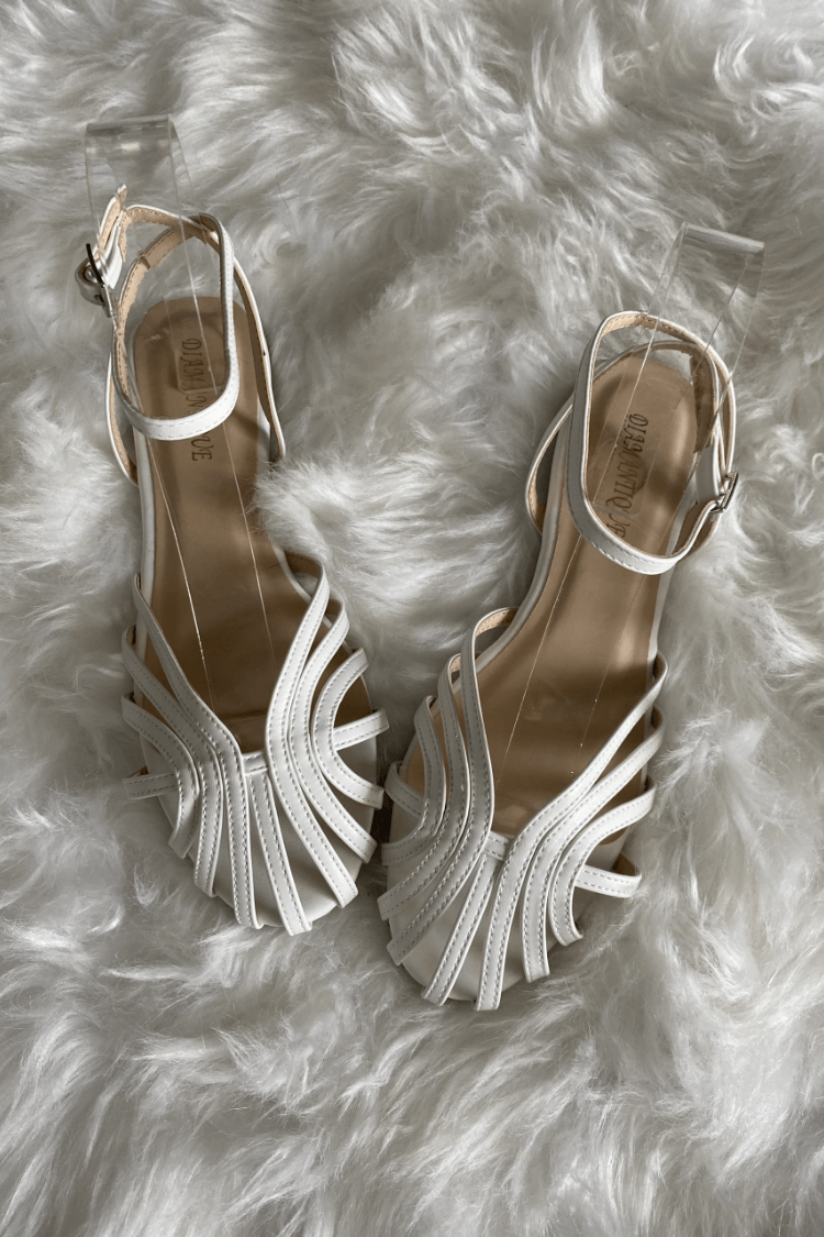 Ruby - Elegant flat woven sandals for a sophisticated look