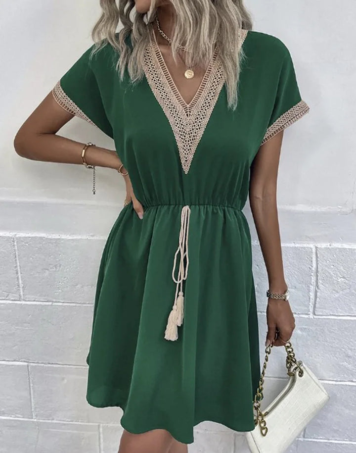 Enyra - Elegant bohemian dress with V-neckline and waist belt for a sophisticated look