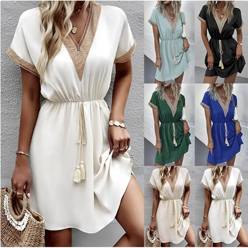 Enyra - Elegant bohemian dress with V-neckline and waist belt for a sophisticated look