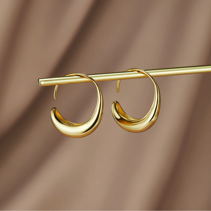 Knotted gold and freshwater pearl earrings