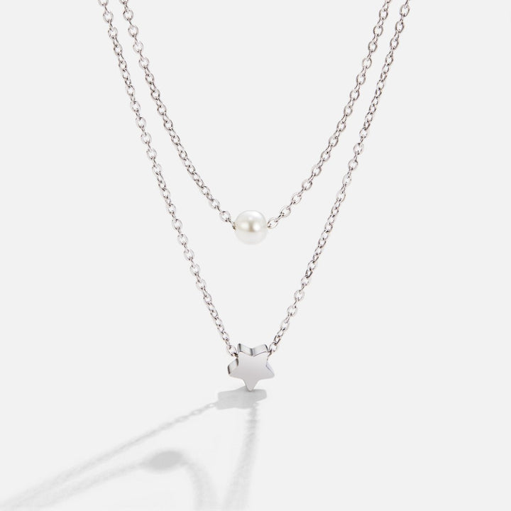 Layered silver star & pearl necklace